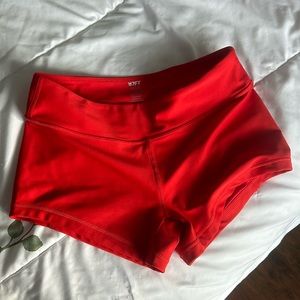 KFT poppy red booty shorts.